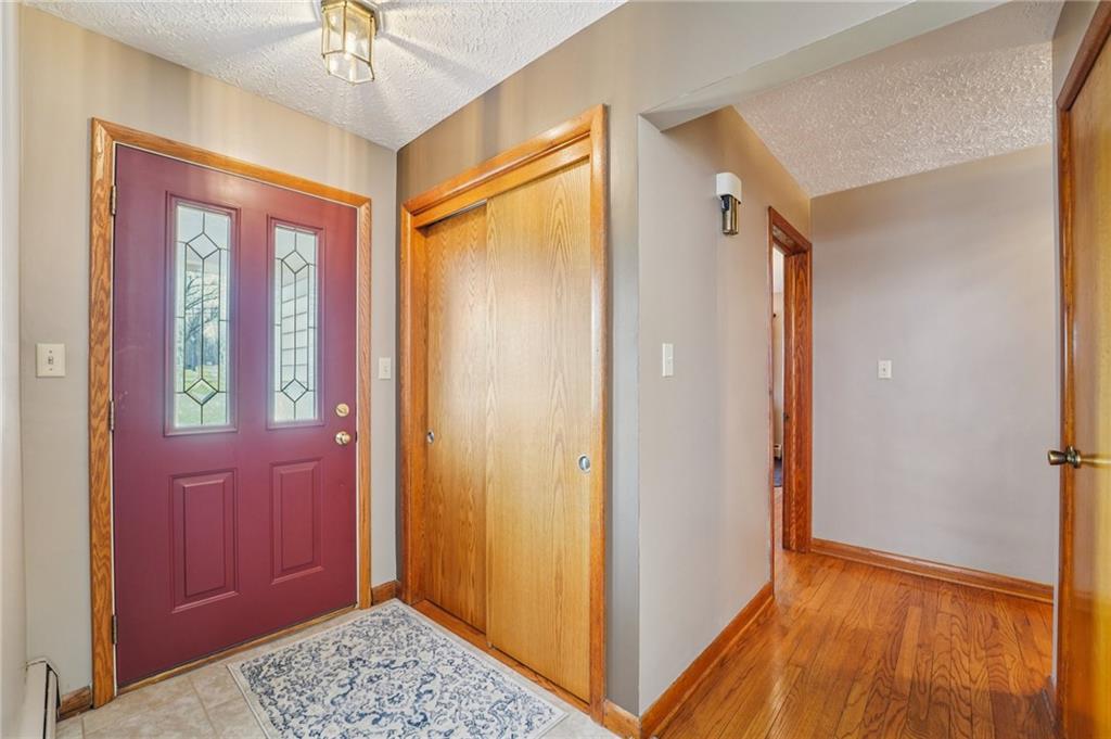 2691 Harlansburg Road New Castle, PA 16101 - Photo 6 of 42 a view of hallway with a mirror and a window