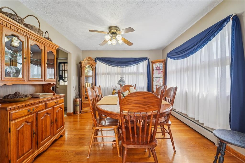 2691 Harlansburg Road New Castle, PA 16101 - Photo 8 of 42 a view of a dining room with furniture window and wooden floor