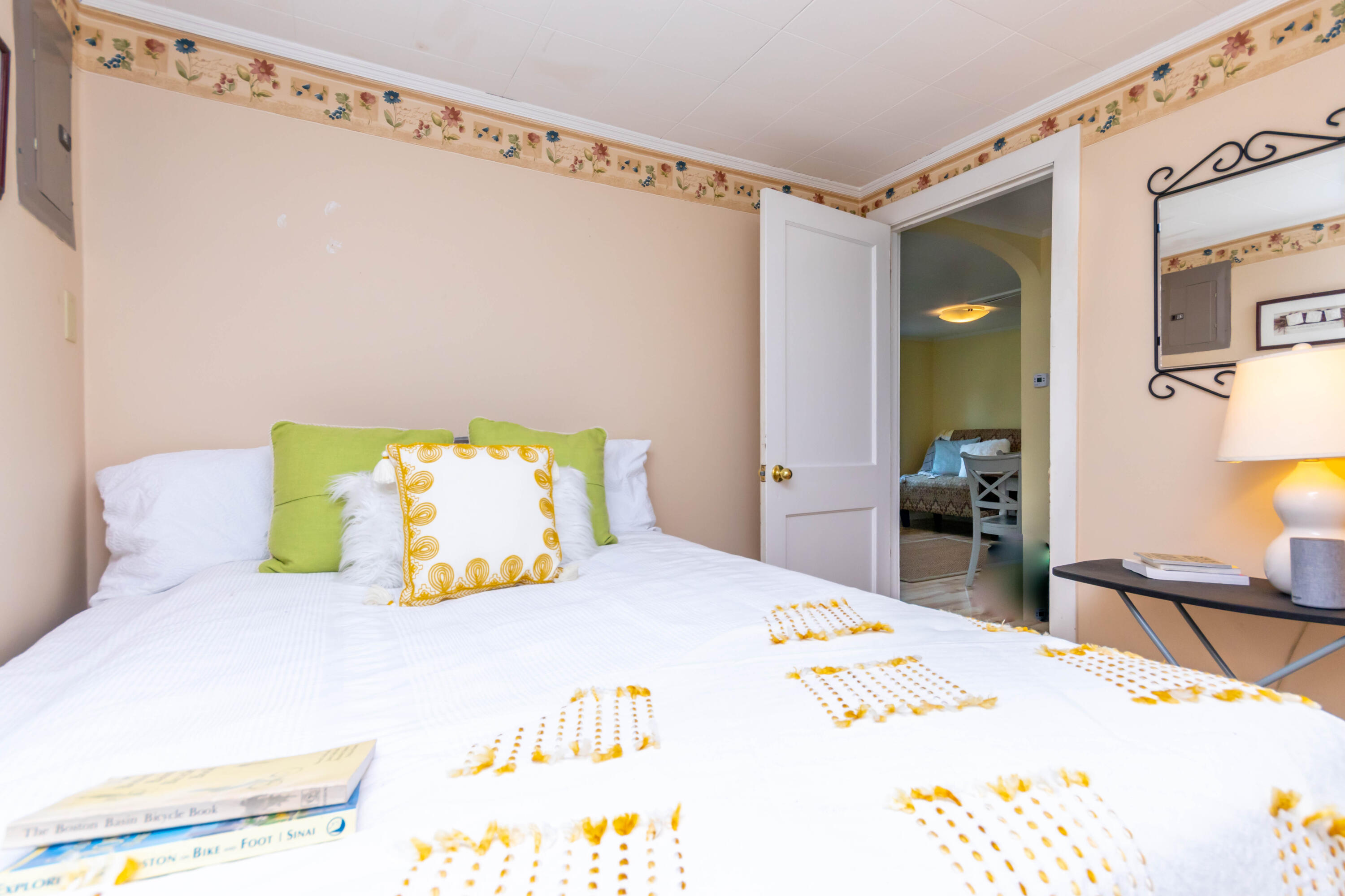 17 Ivy Street Wareham, MA 02571 - Photo 17 of 31 a bedroom with a bed mirror and a table