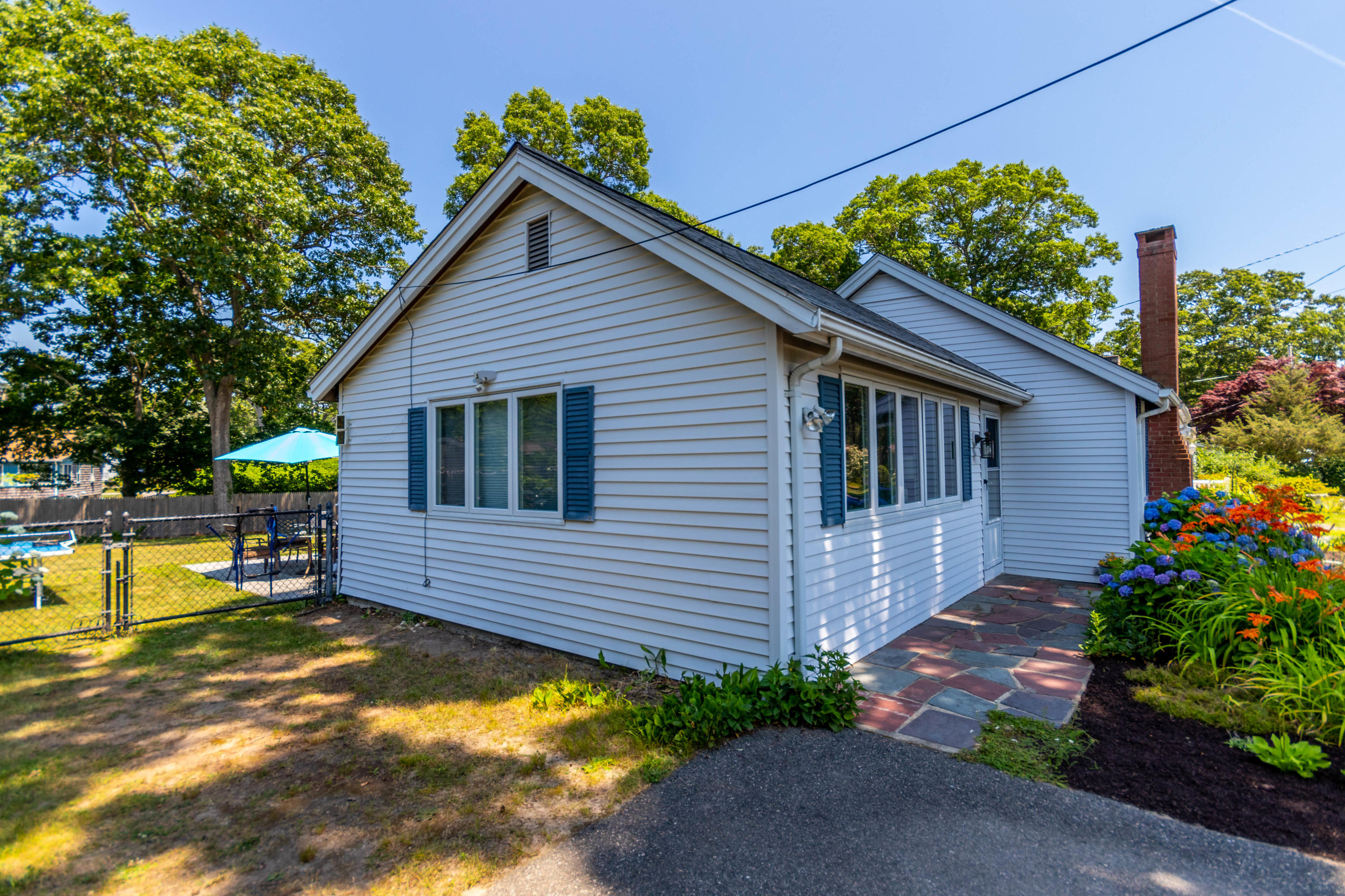 17 Ivy Street Wareham, MA 02571 - Photo 20 of 31 a backyard of a house with lots of green space