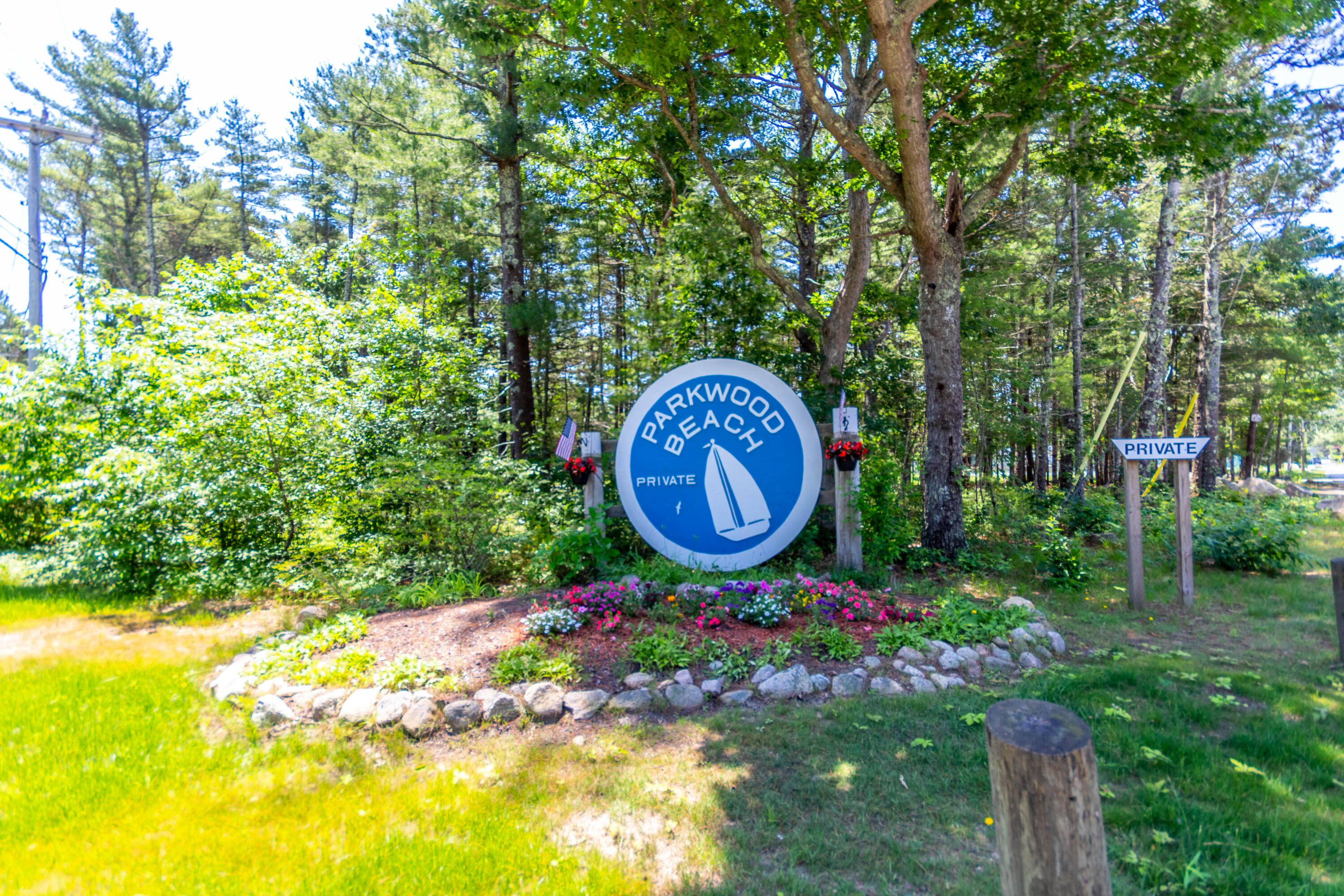 17 Ivy Street Wareham, MA 02571 - Photo 2 of 31 a sign that is on a tree
