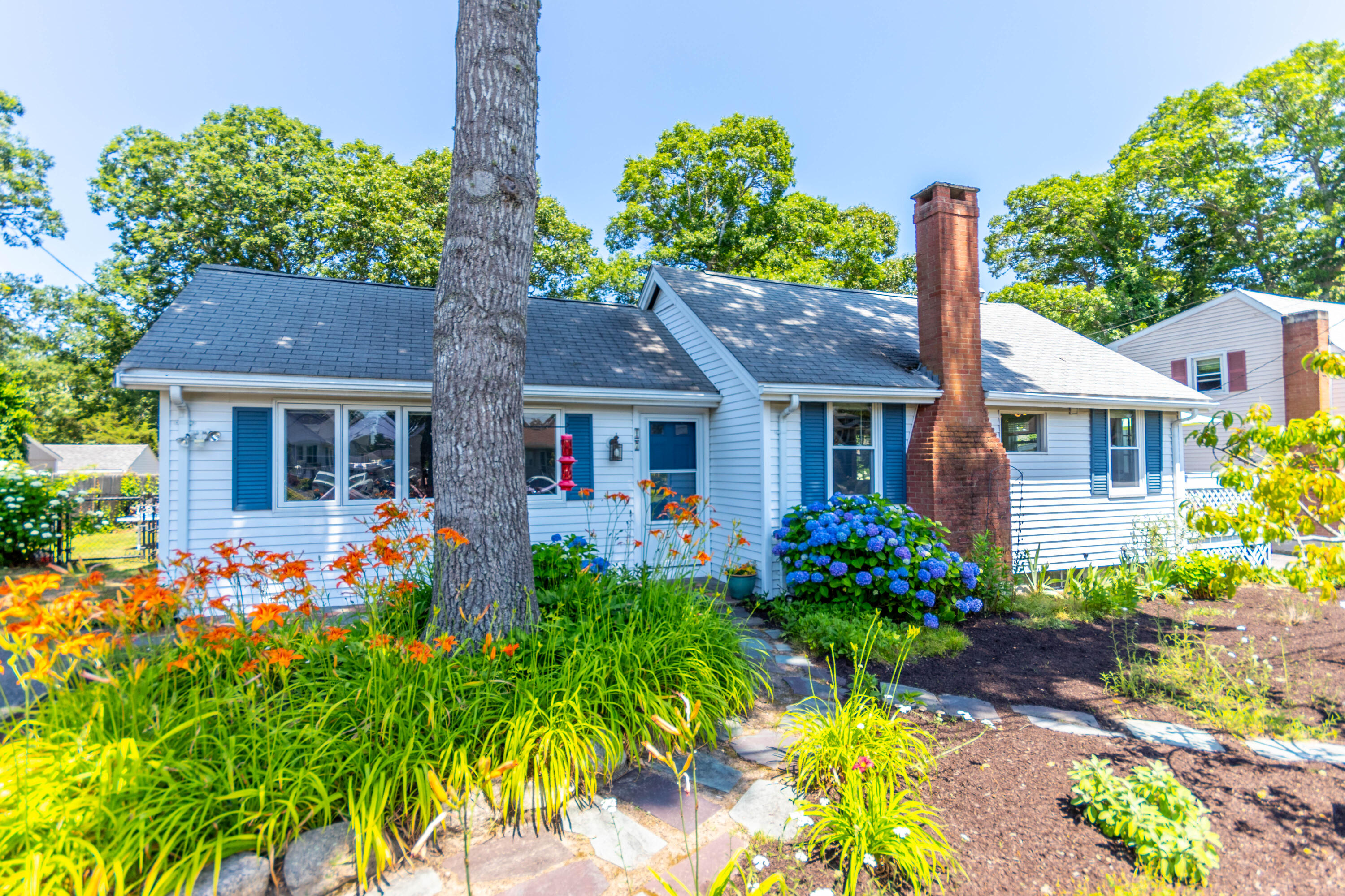 17 Ivy Street Wareham, MA 02571 - Photo 21 of 31 a front view of house with yard and outdoor seating