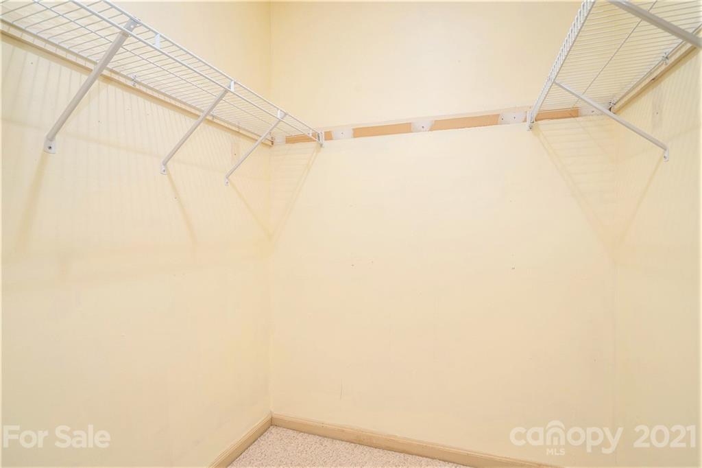 5661 Tuckaseegee Road Kannapolis, NC 28081 - Photo 12 of 18 a view of small space with empty racks