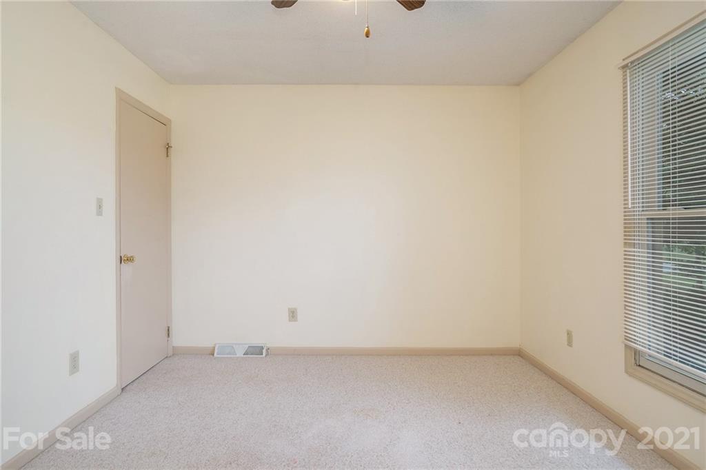 5661 Tuckaseegee Road Kannapolis, NC 28081 - Photo 15 of 18 an empty room with a empty space