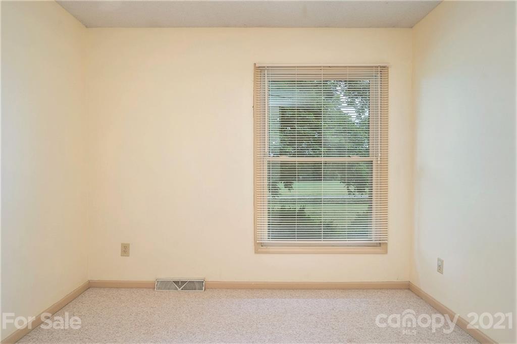 5661 Tuckaseegee Road Kannapolis, NC 28081 - Photo 16 of 18 an empty room with a window