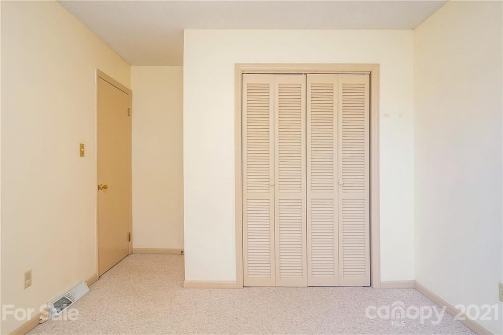 5661 Tuckaseegee Road Kannapolis, NC 28081 - Photo 17 of 18 an empty room with closet area