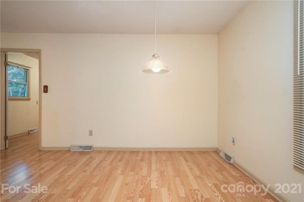 5661 Tuckaseegee Road Kannapolis, NC 28081 - Photo 7 of 18 a view of an empty room