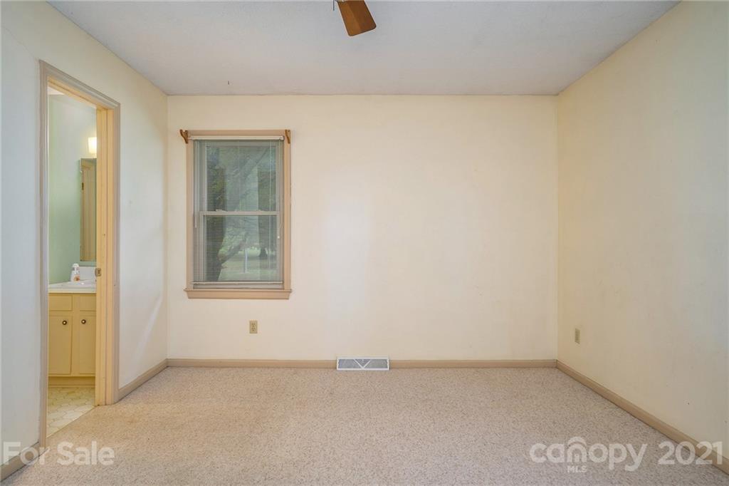 5661 Tuckaseegee Road Kannapolis, NC 28081 - Photo 10 of 18 an empty room with a window