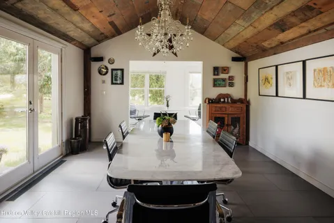 a kitchen with stainless steel appliances kitchen island granite countertop a stove and cabinets