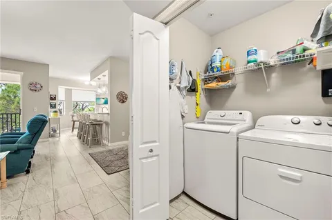 a view of kitchen and utility room