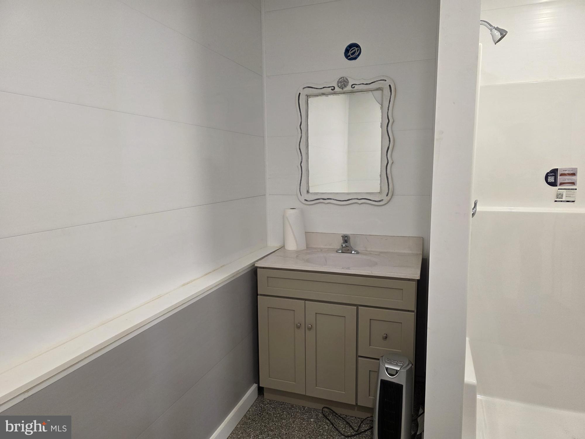 3903 Dressler Ridge Road Mount Pleasant Mills, PA 17853 - Photo 11 of 15 a bathroom with a sink a toilet and mirror