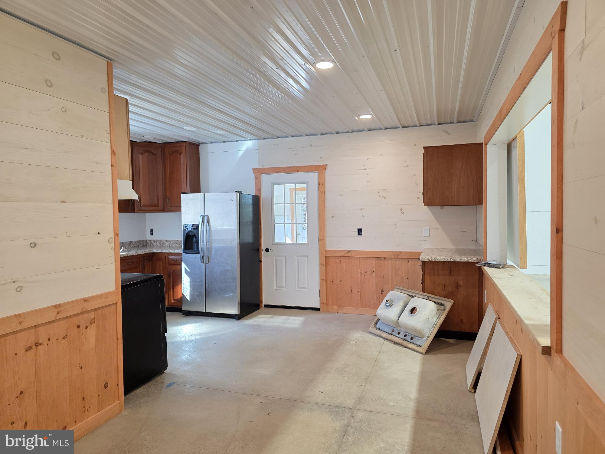 3903 Dressler Ridge Road Mount Pleasant Mills, PA 17853 - Photo 8 of 15 a view of kitchen with refrigerator and window