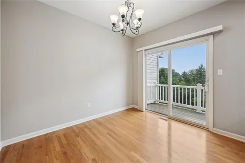 a bathroom with a toilet a sink and a mirror