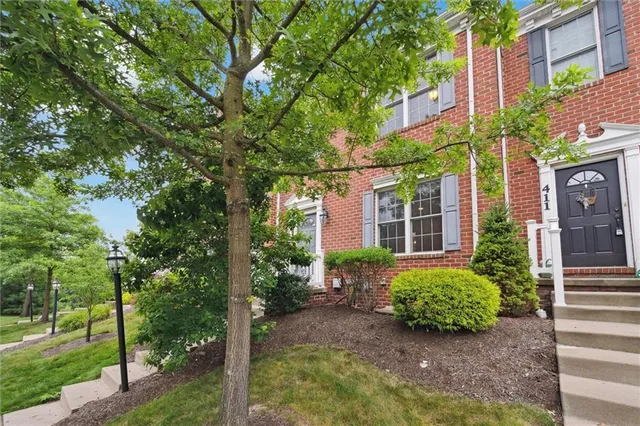 a view of a building with a garden