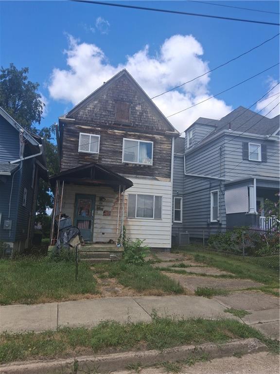 175 Lawrence Avenue Washington, PA 15301 - Photo 2 of 2 a front view of a house with garden