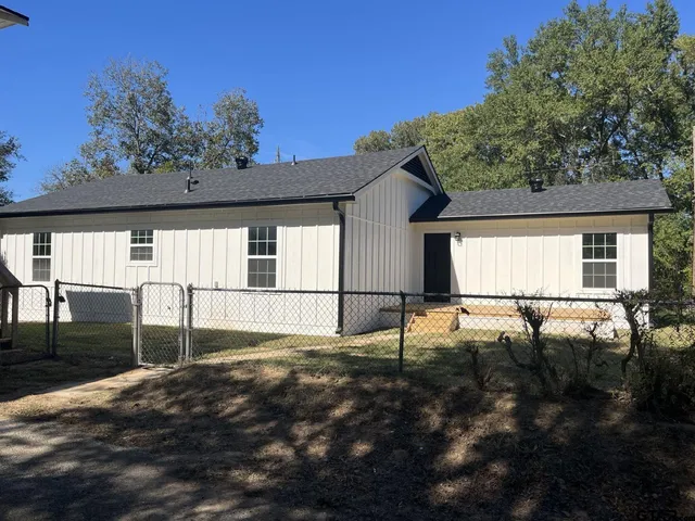 a view of backyard and porch