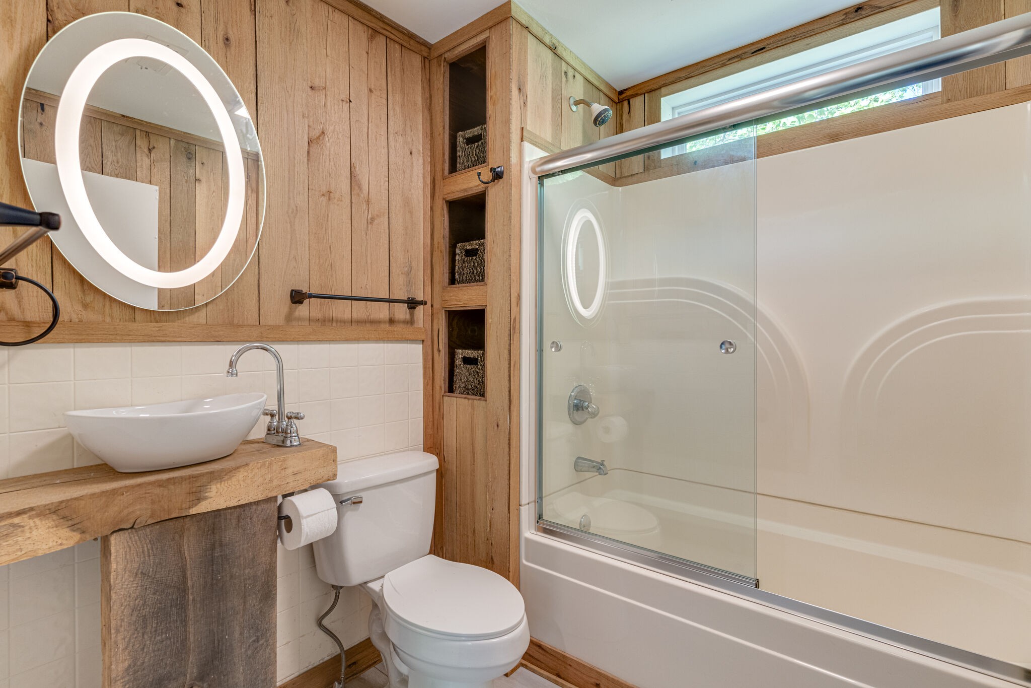7357 Peaceful Acres Road Greenbrier, TN 37073 - Photo 22 of 27 a bathroom with a toilet a sink and a shower