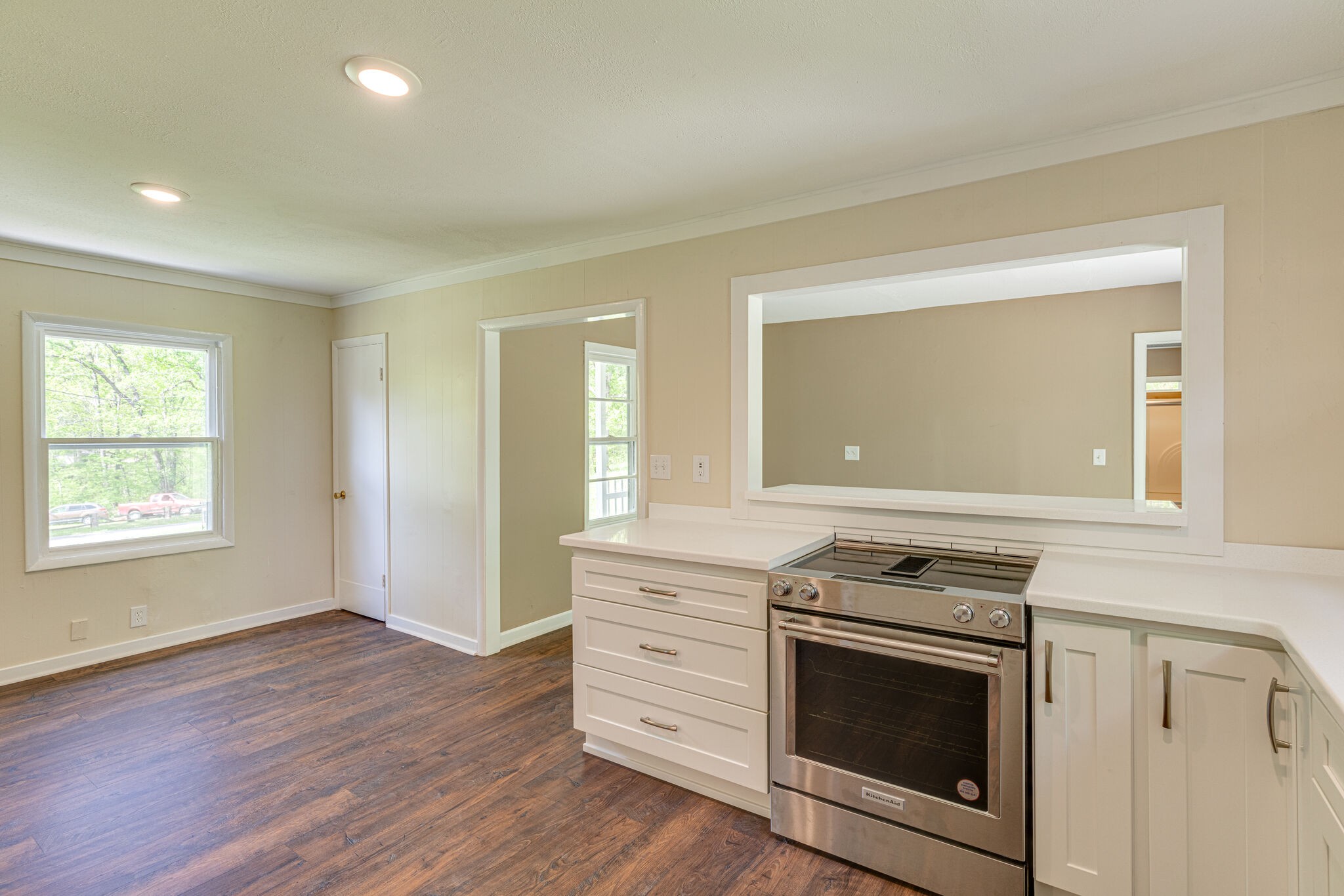 7357 Peaceful Acres Road Greenbrier, TN 37073 - Photo 8 of 27 a view of a kitchen with a stove wooden cabinets and wooden floor