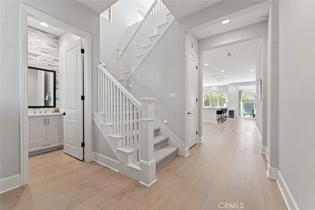 a view of a hallway view with staircase