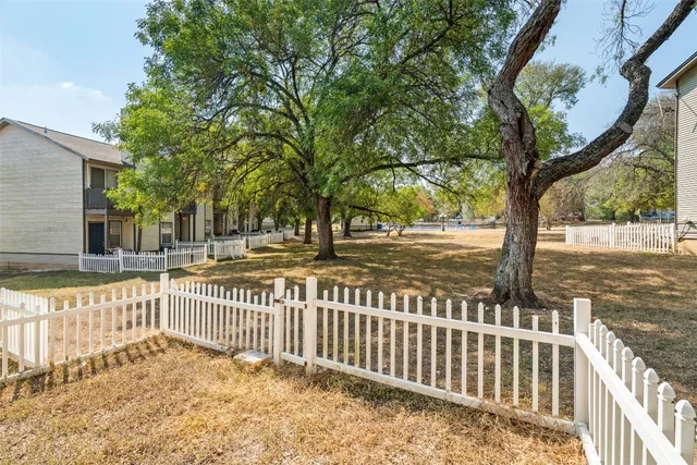 a view of a street with a trees