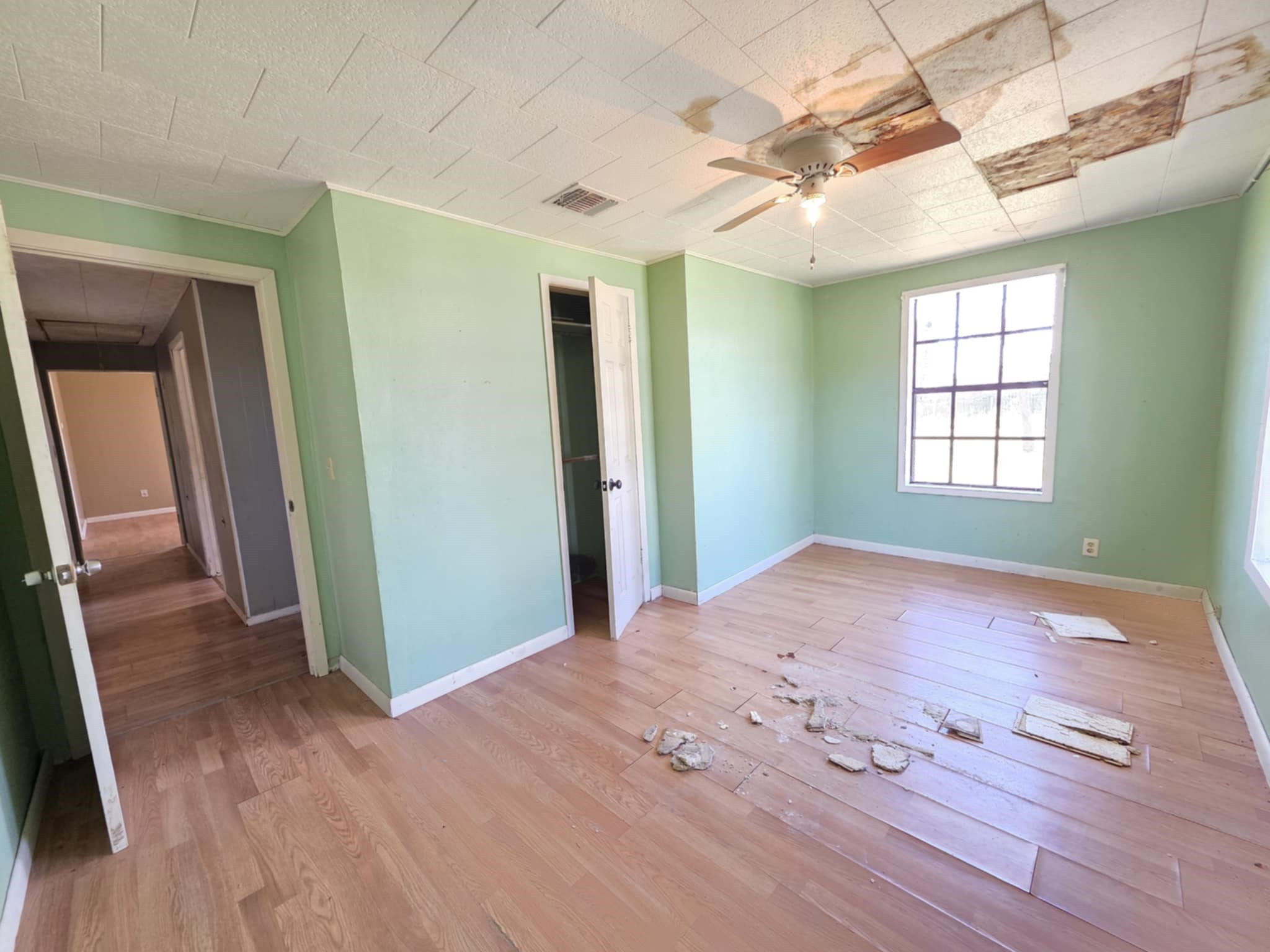 235 2nd Street Van Vleck, TX 77482 - Photo 18 of 23 a view of empty room with window and wooden floor