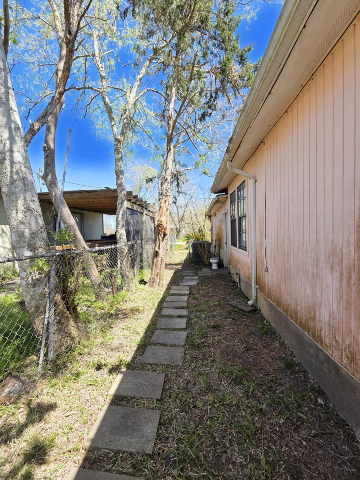 235 2nd Street Van Vleck, TX 77482 - Photo 22 of 23 a view of a backyard with sitting area
