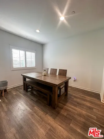 a room with a table and a window