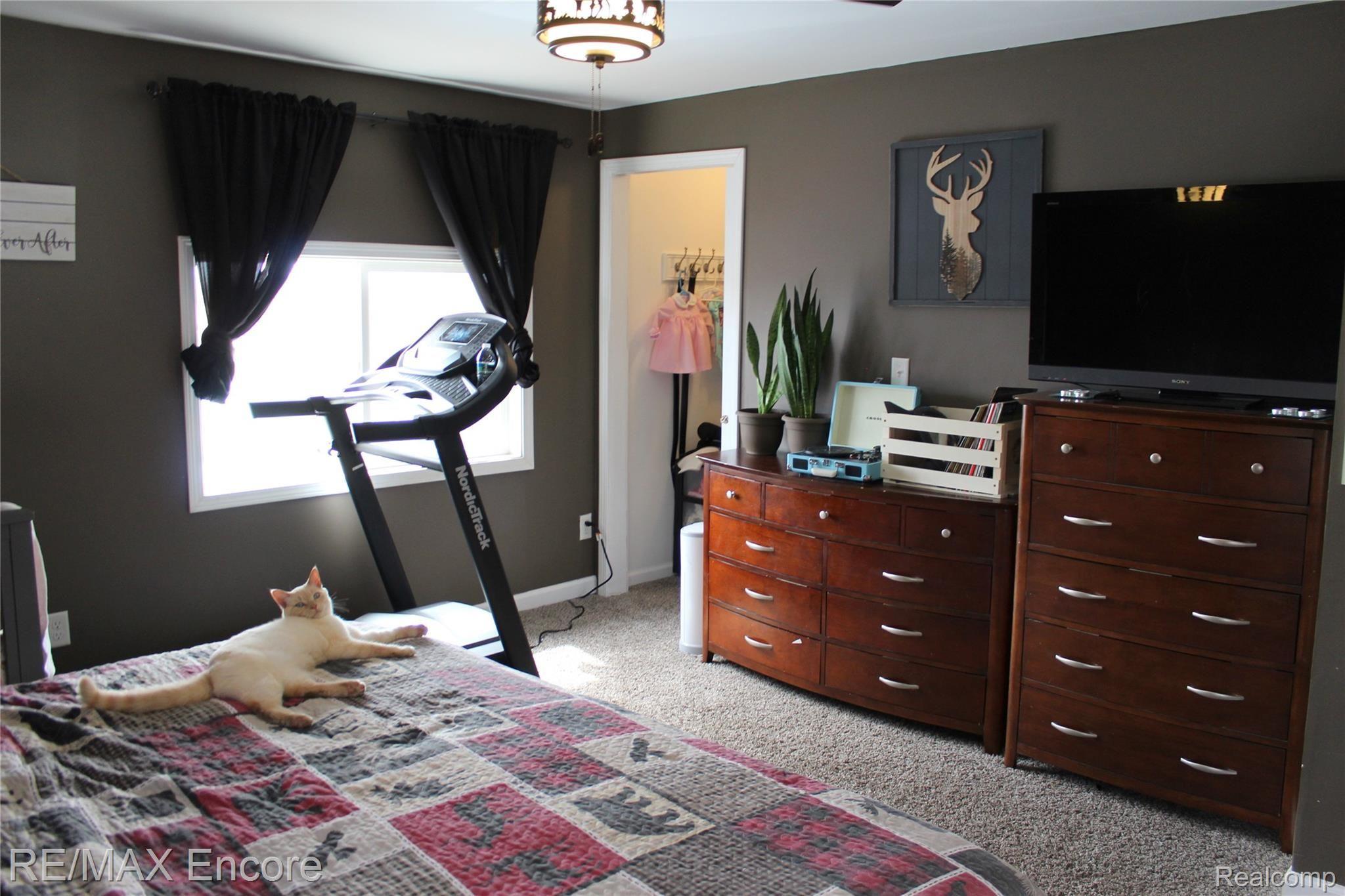 6138 Gunnell Road Millington, MI 48746 - Photo 12 of 23 Private master bedroom