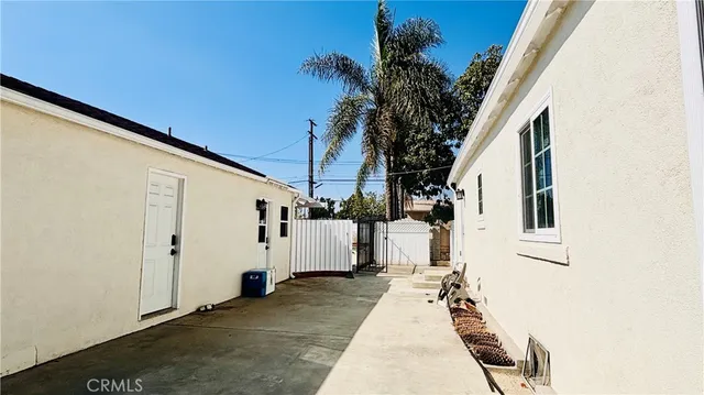 a view of swimming pool with an outdoor space and seating area