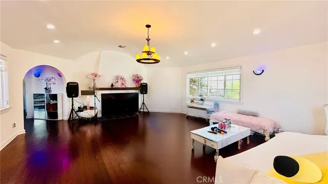 a living room with furniture and a table