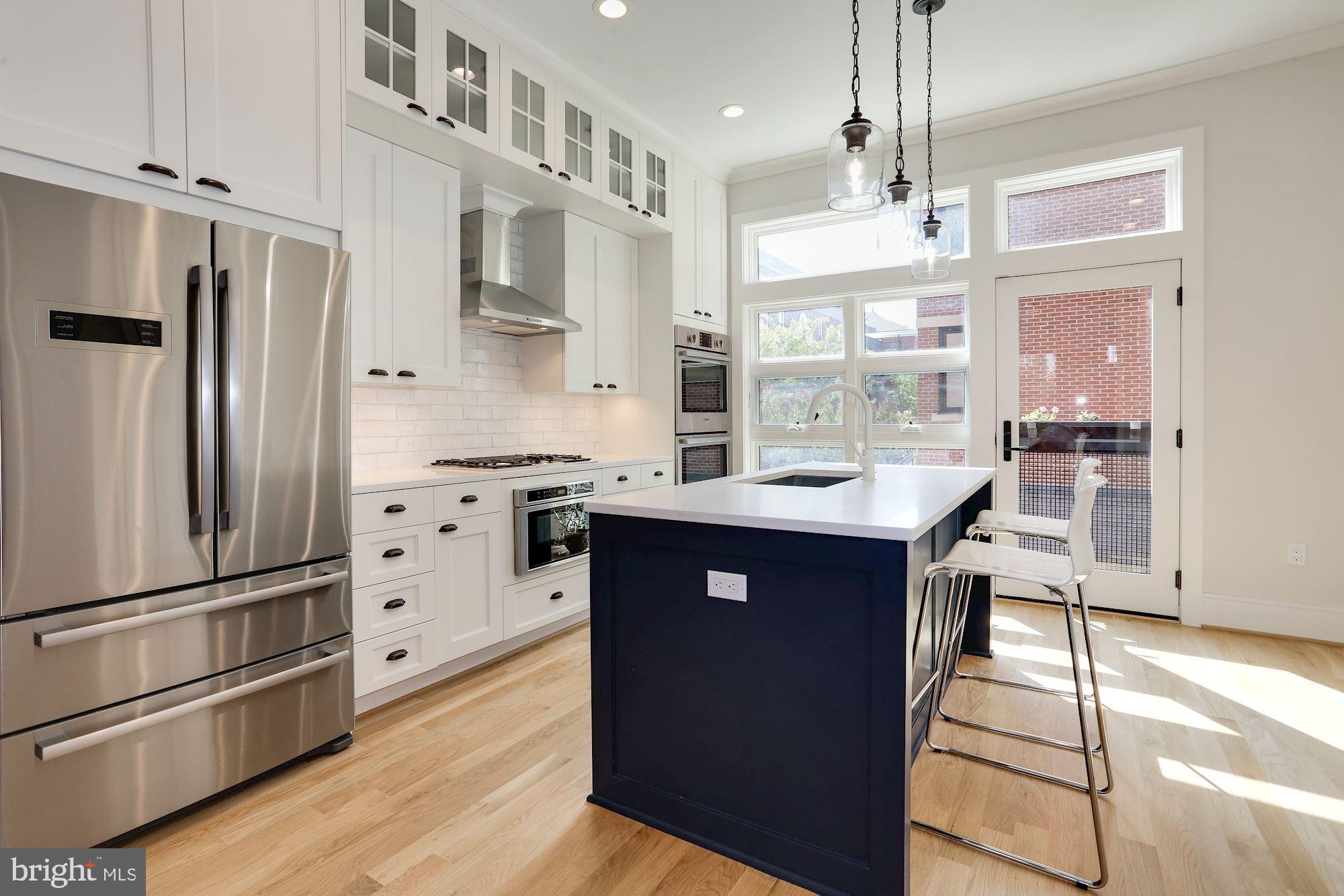 1307 D Street Southeast Washington, DC 20003 - Photo 10 of 69 Gourmet kitchen. Views of managed grounds