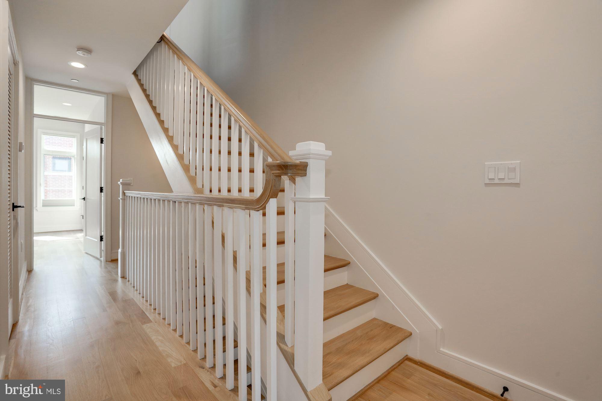 1307 D Street Southeast Washington, DC 20003 - Photo 34 of 69 Oak treads on stairs to match flooring throughout