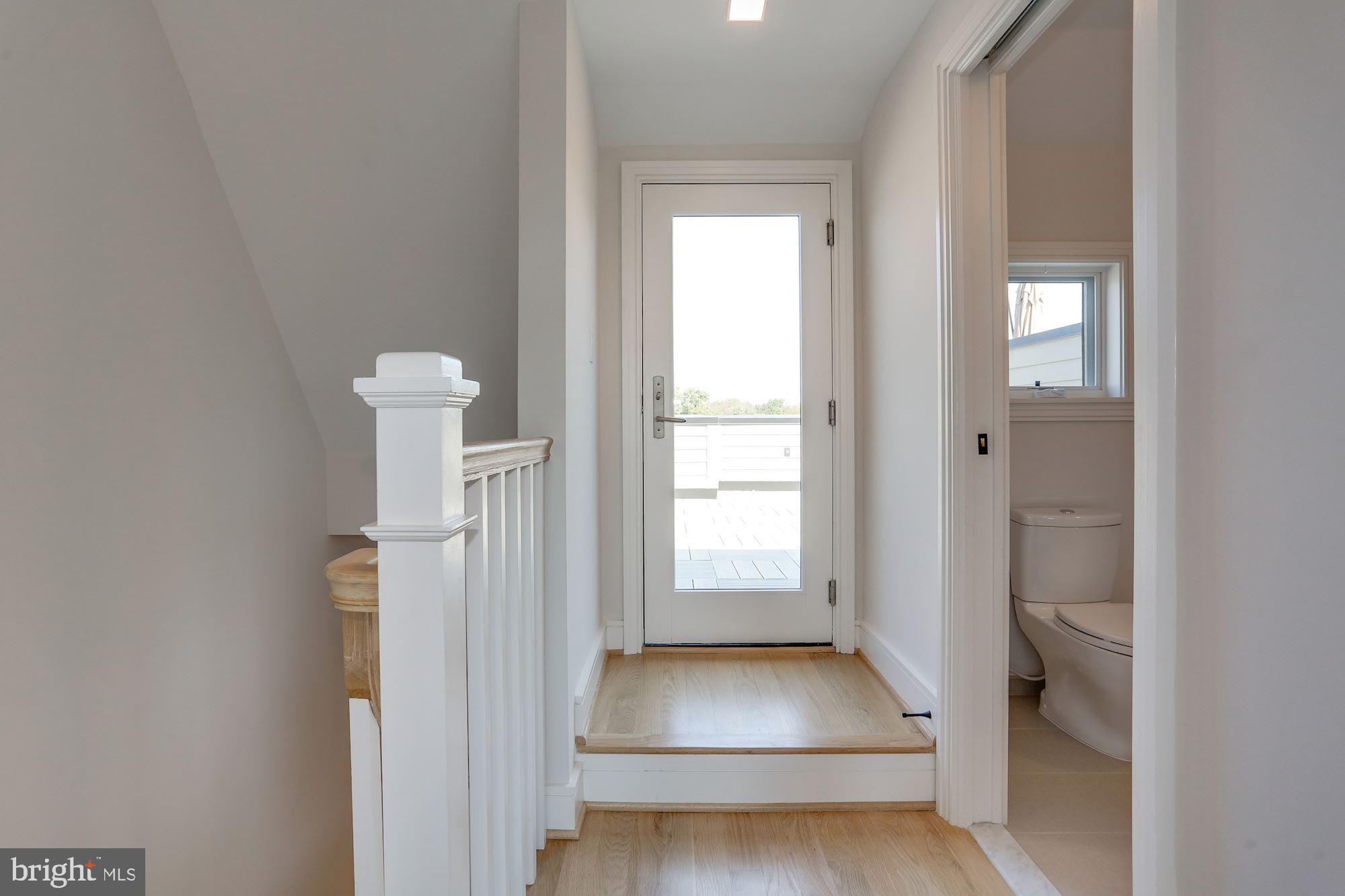 1307 D Street Southeast Washington, DC 20003 - Photo 39 of 69 Third level hallway with full bathroom to the righ