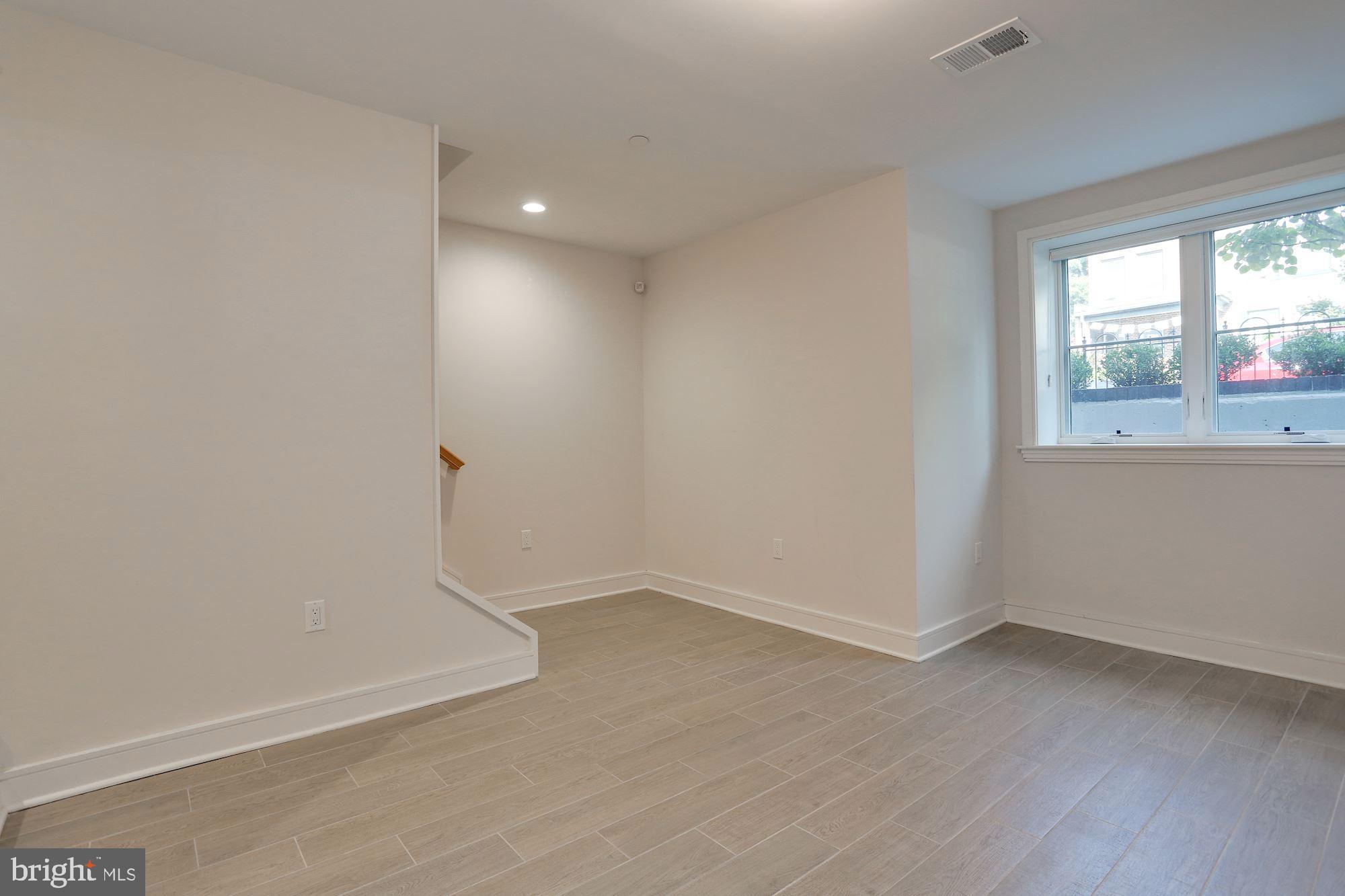 1307 D Street Southeast Washington, DC 20003 - Photo 48 of 69 Den located in finished basement. Full bath.