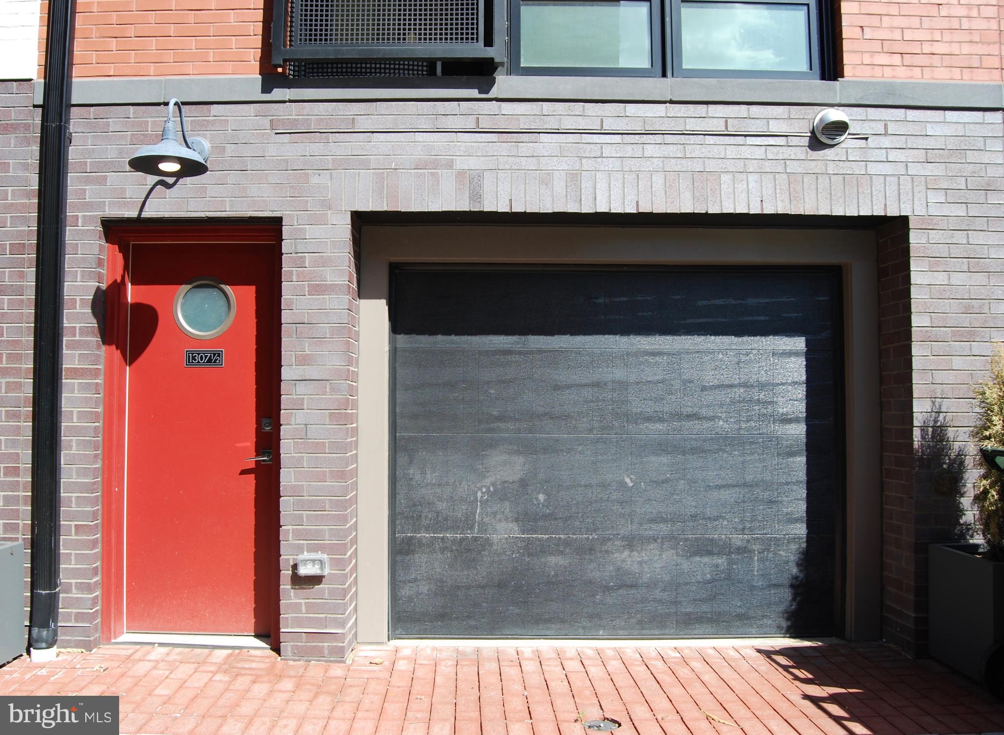 1307 D Street Southeast Washington, DC 20003 - Photo 53 of 69 Built-in one car garage, rear door to Guethler Way