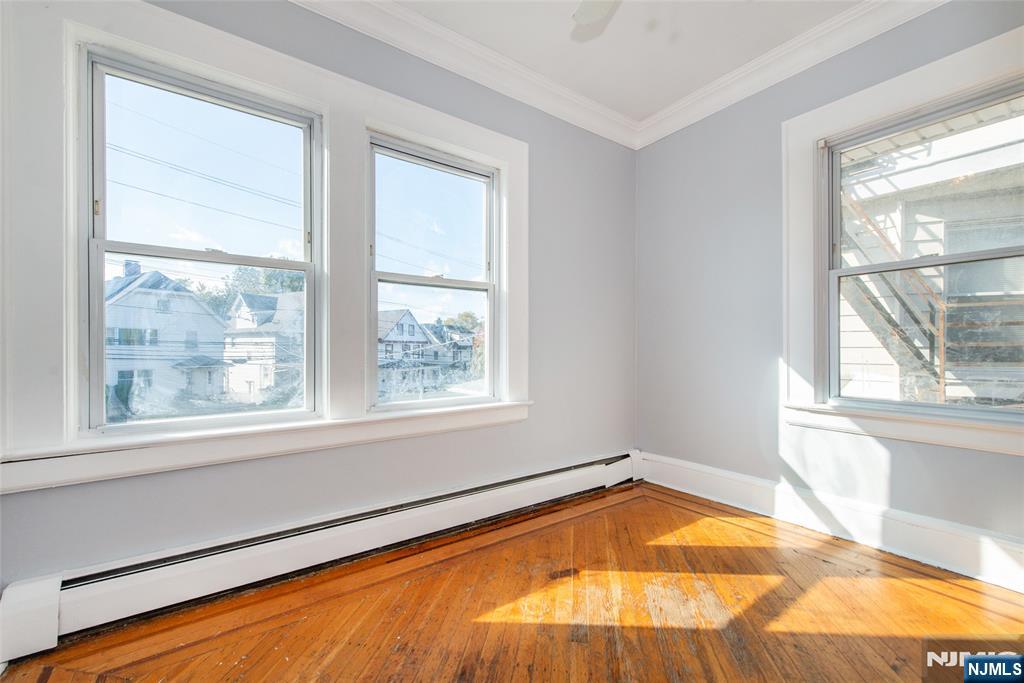 86 Watsessing Avenue, Unit 2 Bloomfield, NJ 07003 - Photo 19 of 23 a view of a room with a large window