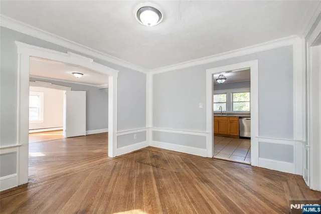 a view of a livingroom with wooden floor
