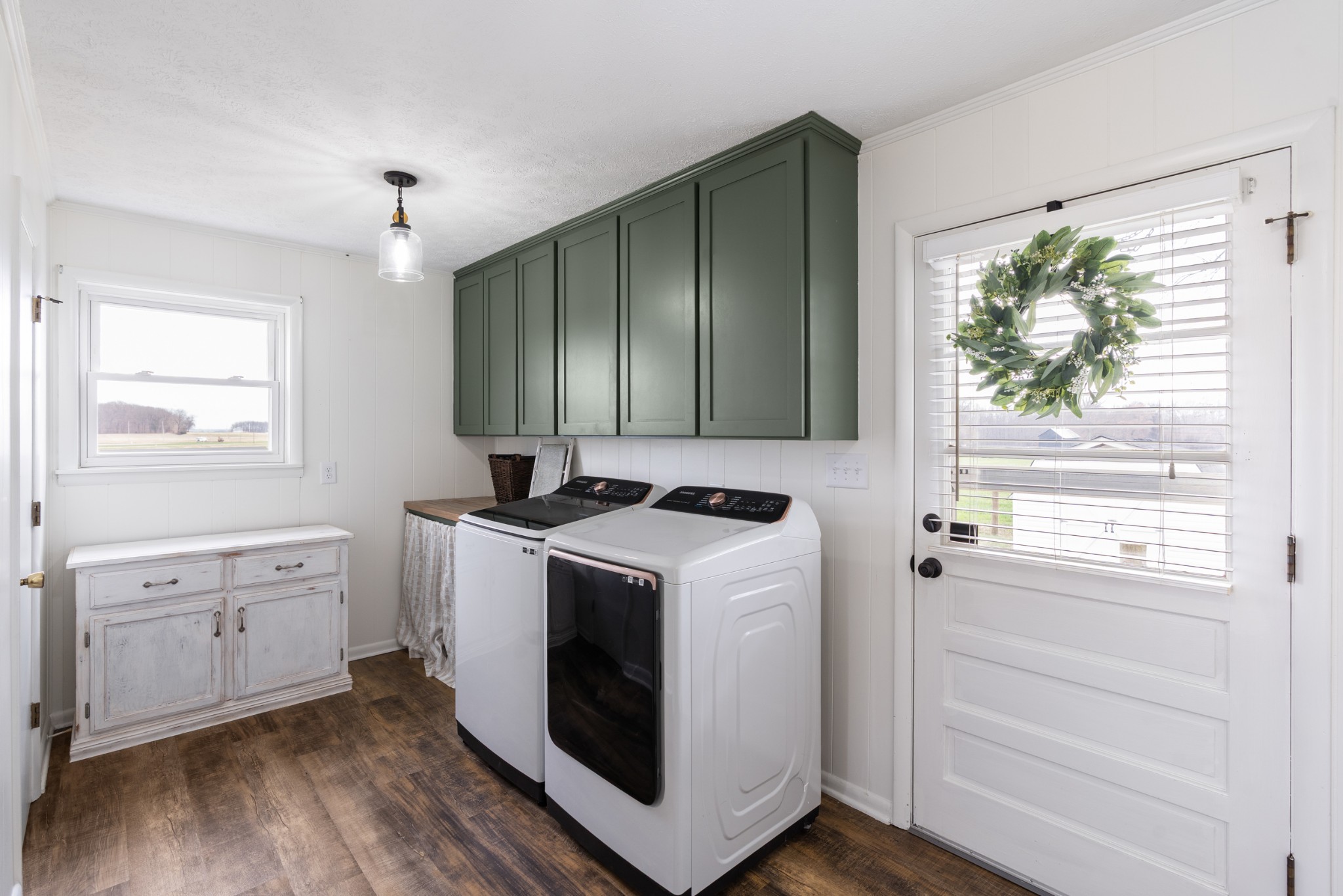 8412 Highway 41 Adams, TN 37010 - Photo 19 of 39 a view of a kitchen with washer and dryer