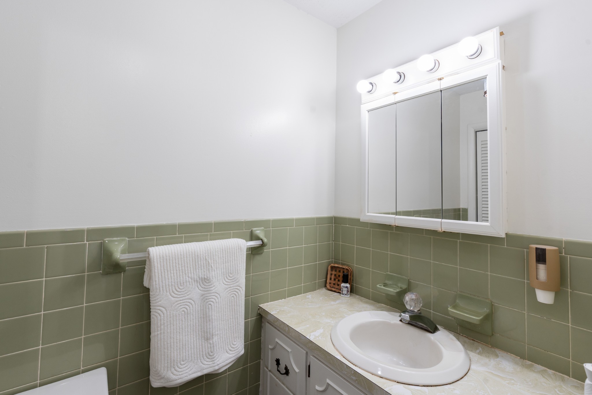 8412 Highway 41 Adams, TN 37010 - Photo 21 of 39 a bathroom with a sink vanity and toilet