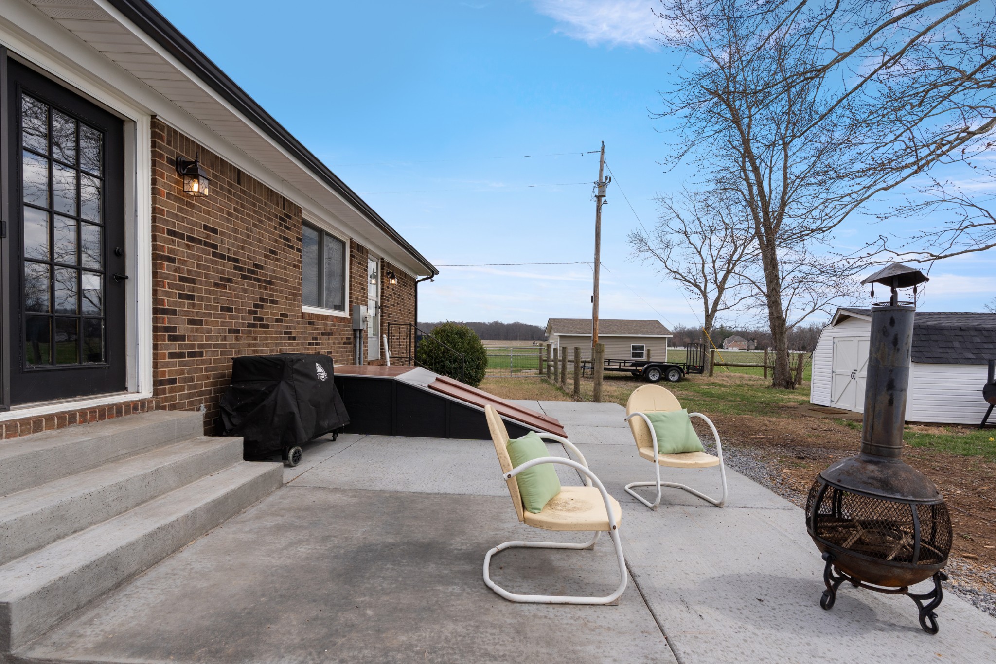 8412 Highway 41 Adams, TN 37010 - Photo 28 of 39 a view of a swimming pool with a lounge chair