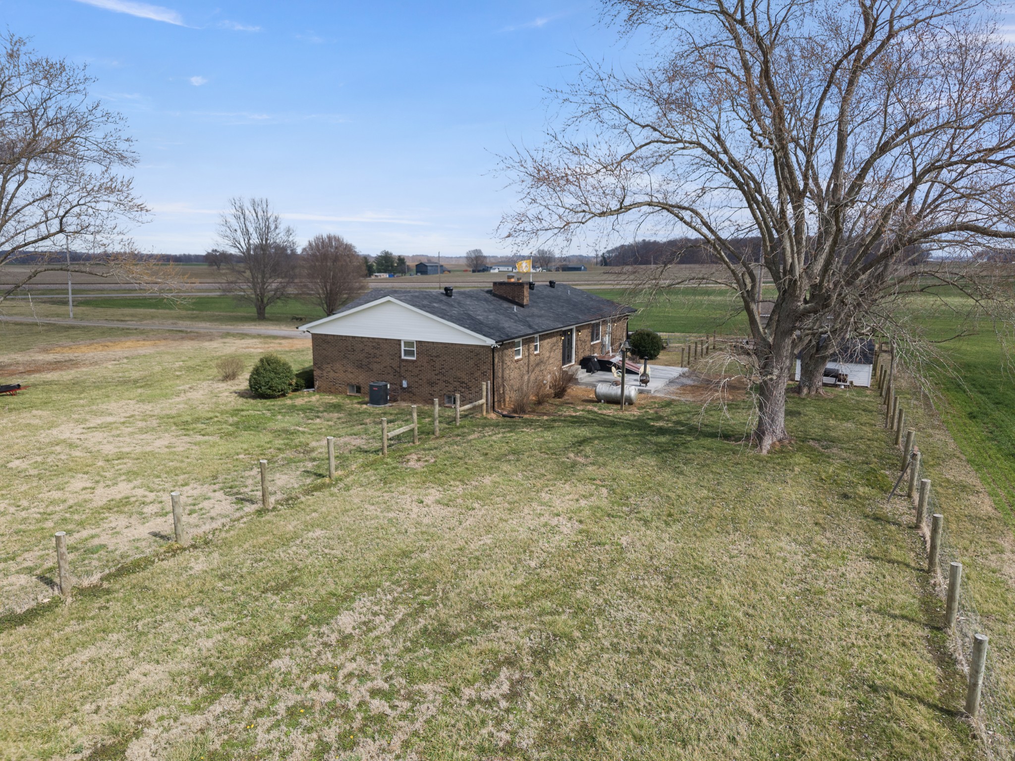 8412 Highway 41 Adams, TN 37010 - Photo 30 of 39 a backyard of a house with table and chairs