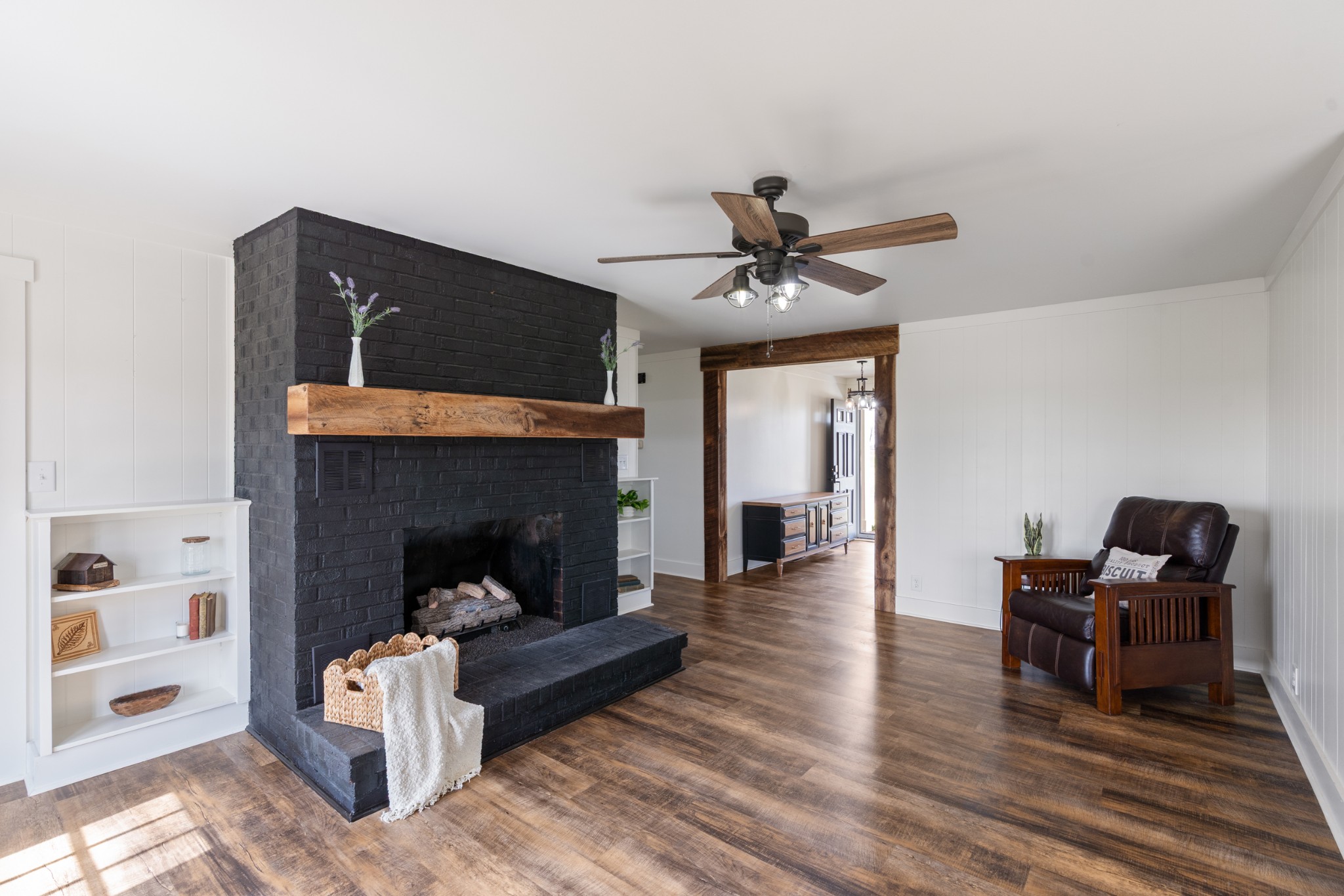 8412 Highway 41 Adams, TN 37010 - Photo 5 of 39 a living room with furniture and a fireplace