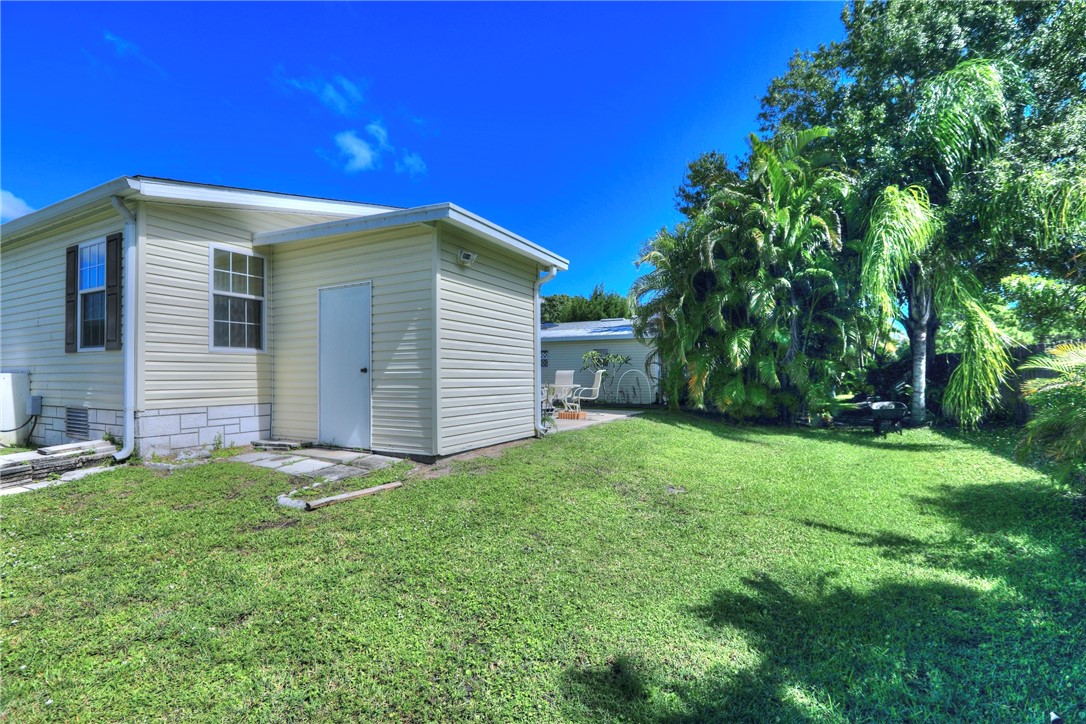 823 Tamarind Circle Sebastian, FL 32976 - Photo 33 of 33 a view of a house with a yard