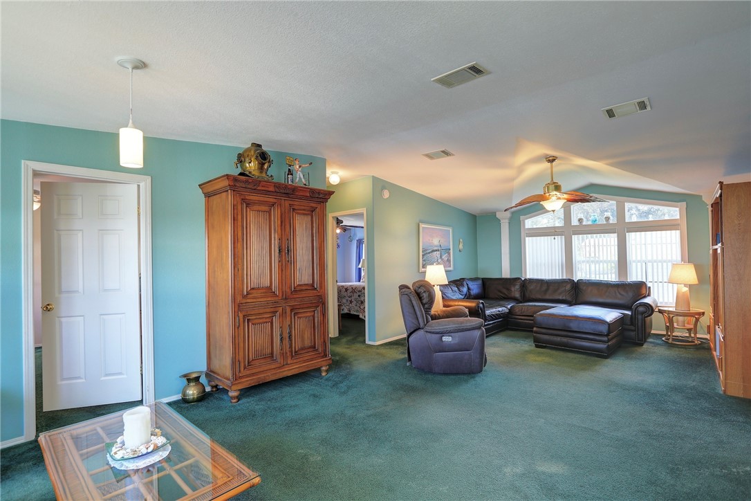 823 Tamarind Circle Sebastian, FL 32976 - Photo 7 of 33 a living room with furniture and a window