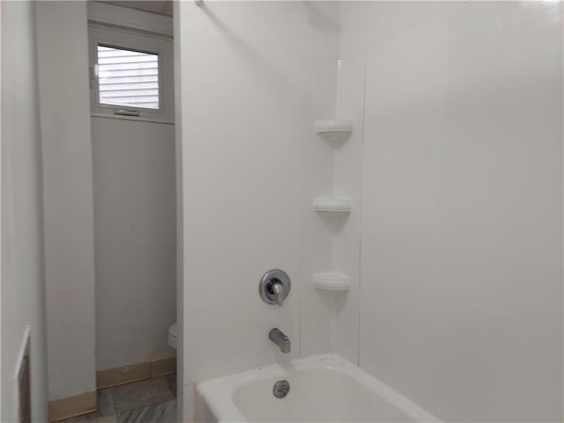 5801 Lincoln Avenue, Unit B Export, PA 15632 - Photo 11 of 19 a bathroom with a bathtub