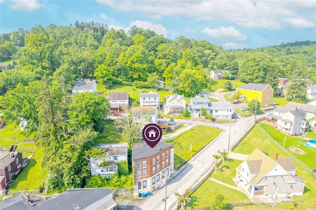 5801 Lincoln Avenue, Unit B Export, PA 15632 - Photo 18 of 19 a view of a swimming pool with a lawn chairs under an umbrella