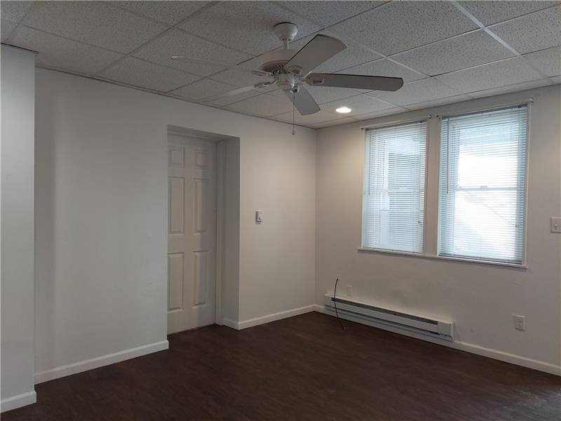 5801 Lincoln Avenue, Unit B Export, PA 15632 - Photo 6 of 19 an empty room with a empty space and a window