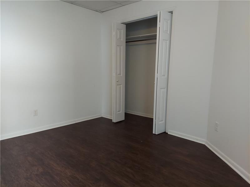 5801 Lincoln Avenue, Unit B Export, PA 15632 - Photo 9 of 19 an empty room with wooden floor and closet