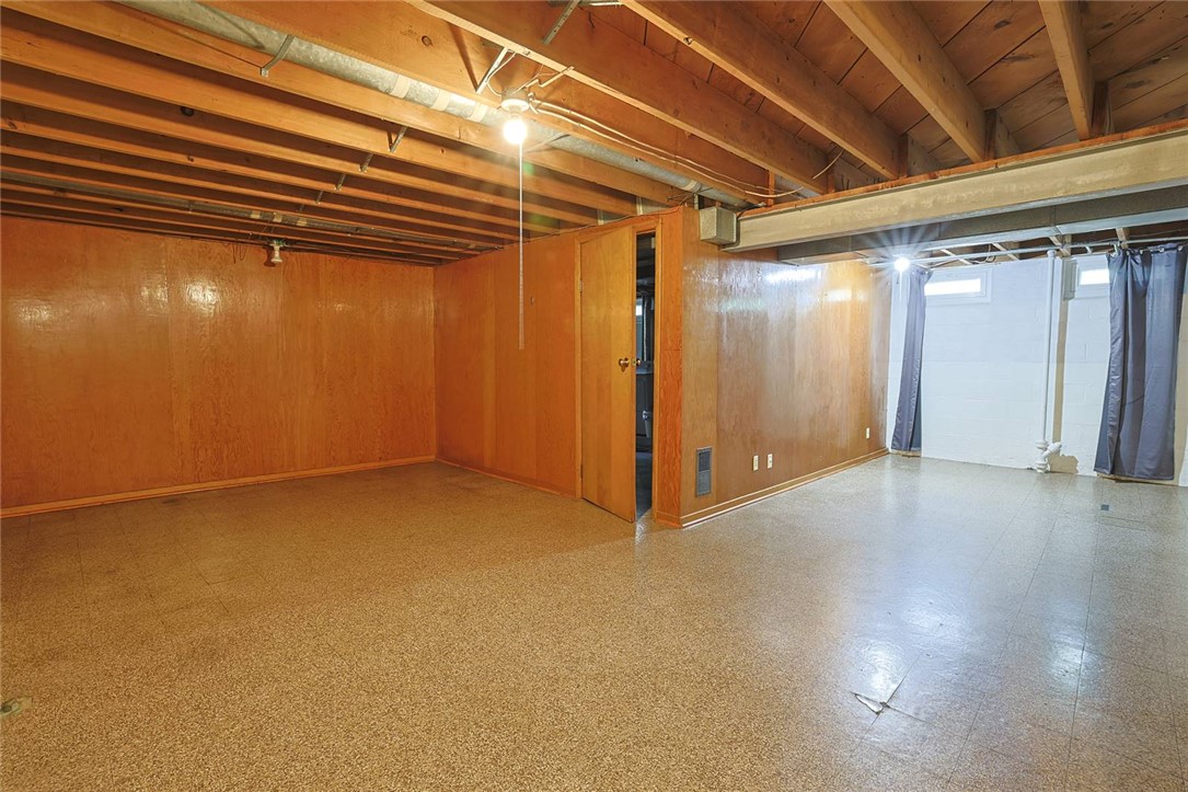 452 Cookston Avenue Springfield, OH 45503 - Photo 20 of 34 This spacious unfinished basement offers endless possibilities for future customization.