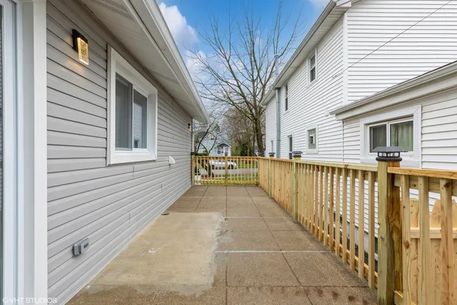 a view of a pathway with a balcony
